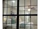 View from outside of a cozy bedroom with ceiling fan and natural light at 5728 Norman Ct, Atlanta, GA 30349