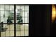View from outside of a naturally lit living room with stylish furniture at 5728 Norman Ct, Atlanta, GA 30349