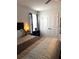 The bedroom features a plush queen bed, complemented by a bedside lamp and a serene view at 860 Point Place Dr, Loganville, GA 30052