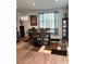 Dining room with a wooden table set and a decorative rug at 860 Point Place Dr, Loganville, GA 30052