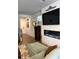 Contemporary living room featuring a fireplace, tv, and comfortable seating at 860 Point Place Dr, Loganville, GA 30052