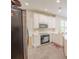 Bright kitchen featuring white cabinets, granite countertops, and stainless steel appliances at 3819 Meandering Sw Way, Lilburn, GA 30047