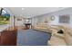 Large finished basement with recreational area featuring a pool table, lounge area, and modern decor at 105 Grogans Lake Dr, Atlanta, GA 30350