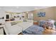 Open-concept living area showcasing a comfortable seating area and access to the kitchen at 105 Grogans Lake Dr, Atlanta, GA 30350