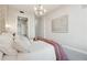 Tranquil bedroom with soft lighting, stylish wallpaper, and a cozy atmosphere at 1820 Peachtree Nw St # 804, Atlanta, GA 30309