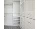 Spacious walk-in closet with custom shelving and ample storage space at 1820 Peachtree Nw St # 804, Atlanta, GA 30309