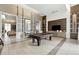Spacious game room with a pool table, stylish decor, and an inviting view of the adjacent living area at 1820 Peachtree Nw St # 804, Atlanta, GA 30309