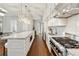 Stylish kitchen featuring granite counters, stainless steel appliances, and pendant lighting above the island at 1820 Peachtree Nw St # 804, Atlanta, GA 30309