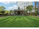 Inviting outdoor space with a well-maintained lawn and stylish building, perfect for events and leisure at 1820 Peachtree Nw St # 804, Atlanta, GA 30309