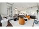 Spacious living area with balcony access and an open floor plan to the dining and kitchen areas at 1820 Peachtree Nw St # 804, Atlanta, GA 30309