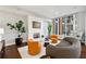 Comfortable living room featuring a modern fireplace, stylish furniture, and natural light at 1820 Peachtree Nw St # 804, Atlanta, GA 30309