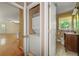 Bathroom with washer/dryer hookups next to a vanity with sink at 2262 Hurt Sw Rd, Marietta, GA 30008