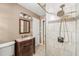 Updated bathroom features a tiled shower and vanity with a marble countertop at 2262 Hurt Sw Rd, Marietta, GA 30008