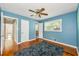 Stylish bedroom featuring hardwood floors and access to the bathroom at 2262 Hurt Sw Rd, Marietta, GA 30008