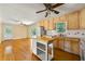 Kitchen with island and hardwood flooring open to the living space at 2262 Hurt Sw Rd, Marietta, GA 30008