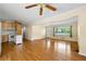 Inviting living room with hardwood floors, open layout, and kitchen access at 2262 Hurt Sw Rd, Marietta, GA 30008
