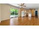 Bright living room with hardwood floors, open to kitchen and backyard views at 2262 Hurt Sw Rd, Marietta, GA 30008
