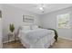 Comfortable bedroom with soft lighting, a queen-size bed, and a calming color palette at 2315 Fisher Dr, Loganville, GA 30052