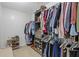 Organized walk-in closet with ample storage and stylish shelving units at 2315 Fisher Dr, Loganville, GA 30052