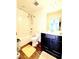 This is a clean, well-lit bathroom with a tub shower and updated fixtures at 6408 Kennonbriar Ct, Lithonia, GA 30058