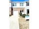 Charming two-story townhome with a one-car garage and well-maintained front yard at 6408 Kennonbriar Ct, Lithonia, GA 30058