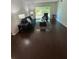 Cozy living room with hardwood floors and a sliding glass door at 6851 Roswell Rd # O10, Atlanta, GA 30328