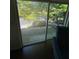 View from the patio sliding glass doors, looking out onto the private balcony at 6851 Roswell Rd # O10, Atlanta, GA 30328