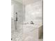 Elegant bathroom with soaking tub and marble countertop in an upscale home at 2015 N Decatur Ne Rd, Atlanta, GA 30307
