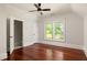 Spacious bedroom with hardwood floors, walk-in closet, and plenty of natural light at 2015 N Decatur Ne Rd, Atlanta, GA 30307
