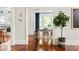 Bright dining area with hardwood floors and view to kitchen, showcasing modern interiors and stylish design at 2015 N Decatur Ne Rd, Atlanta, GA 30307