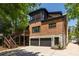 Stunning brick home boasts an attached two car garage and screened in porch for outdoor relaxation at 2015 N Decatur Ne Rd, Atlanta, GA 30307
