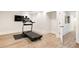 Home gym with a treadmill, tv, recessed lights, and neutral color scheme at 2015 N Decatur Ne Rd, Atlanta, GA 30307