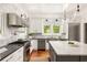 Well-lit kitchen features stainless steel appliances and a center island at 2015 N Decatur Ne Rd, Atlanta, GA 30307