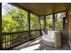 Relaxing screened porch with stone floors and wooded views at 2015 N Decatur Ne Rd, Atlanta, GA 30307