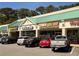 Street view of a commercial building with stores and parking in front at 2015 N Decatur Ne Rd, Atlanta, GA 30307