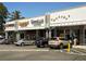 Street view of commercial building with several storefronts and street parking at 2015 N Decatur Ne Rd, Atlanta, GA 30307