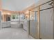 Bright bathroom with soaking tub and shower at 5300 Coacoochee Ter, Johns Creek, GA 30022