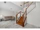 Spacious foyer with marble floors, staircase, and a glimpse into the elegant living area at 5300 Coacoochee Ter, Johns Creek, GA 30022