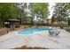 Inviting swimming pool with gazebo and table with chairs at 5300 Coacoochee Ter, Johns Creek, GA 30022