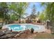Backyard oasis features a swimming pool, gazebo, and professionally landscaped yard at 5300 Coacoochee Ter, Johns Creek, GA 30022