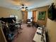Well-lit bedroom offering versatile space for a home office or creative hobbies at 1598 Lenox Overlook Ne Rd, Atlanta, GA 30329
