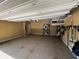 This garage features a sealed floor, overhead storage and many storage racks at 1598 Lenox Overlook Ne Rd, Atlanta, GA 30329