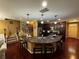 Open kitchen with a granite countertop island, stainless steel appliances, and hardwood floors at 1598 Lenox Overlook Ne Rd, Atlanta, GA 30329