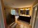 A full main bathroom with a glass enclosed shower and bath, a double sink vanity, large mirror, and tile flooring at 1598 Lenox Overlook Ne Rd, Atlanta, GA 30329