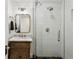 Modern bathroom with glass-enclosed shower and marble vanity at 2648 Rivers Nw Rd, Atlanta, GA 30305