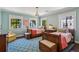 Charming bedroom featuring two twin beds, aqua walls, and sun-filled windows at 2648 Rivers Nw Rd, Atlanta, GA 30305