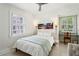 Bright bedroom featuring plantation shutters and stylish decor at 2648 Rivers Nw Rd, Atlanta, GA 30305