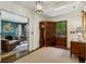 Grand foyer featuring wood floors, a decorative rug, and a view of the den at 2648 Rivers Nw Rd, Atlanta, GA 30305