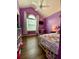 Bright bedroom features a vaulted ceiling, modern fan, and large window at 305 Pleasant Forest Dr, Temple, GA 30179