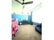Bright bedroom with colorful decor, study area, and comfortable beanbag chair at 305 Pleasant Forest Dr, Temple, GA 30179